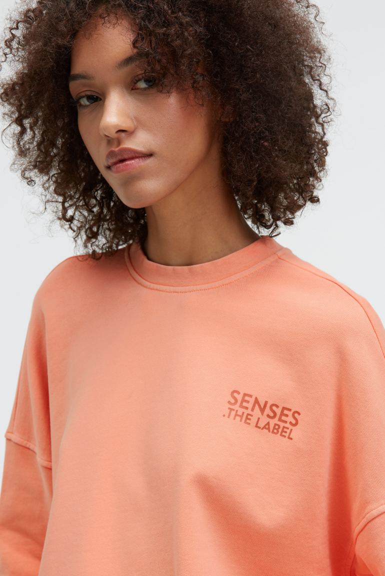 SWEATSHIRT STAR:LIGHT MIT GEWASCHENER OPTIK UND BACKPRINT VON SENSES IN PEACH NECTAR MZ#00951 Mode-Zauber