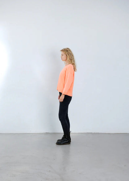 SWEATSHIRT NIKITA SMILEY VON OUTRYGHT IN NEON ORANGE MZ#00667